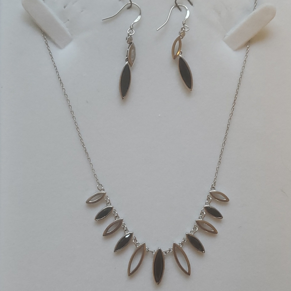 Silver necklace and earrings